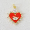 Macro detail of red heart pendant with evil eye motif and clear cubic zirconia in gold - Red Gold Heart Evil Eye Style (05)
