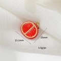 Macro shot of 13.1x15mm pomegranate pendant with red seeds texture and gold plating - Red Pomegranate (18)