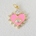 Macro detail of gold plated heart pendant with pink enamel, evil eye, and zircon accents - Pink Gold Heart Evil Eye Style (09)