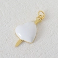 Macro detail of heart and arrow pendant with white enamel and golden metal finish - White Gold Arrow Through Heart Style (10)