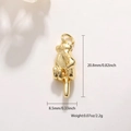 Macro view of gold-plated palm pendant with middle finger design showing precise dimensions - Middle Finger Gesture (19)