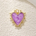 Detailed macro view of heart charm with gold plating and purple marble enamel texture - Dreamy Purple Heart (35)