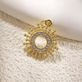Golden sunburst pendant with micro-inset zircons on a white textured background - Beaded Radiant Style (A0719)