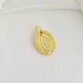 Detailed relief of Golden Virgin Mary oval pendant on textured cream background - Minimalist Virgin Mary Relief Style (13)