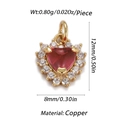Macro shot of heart-shaped gold-plated copper pendant with red stone and pavé accents - Red Heart Full Diamond (34)