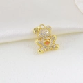 Detailed close-up of a golden teddy bear pendant featuring sparkling white zircons and heart core - Golden Hollow Heart Pink Stone Bear Style (21)
