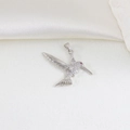 Detailed view of silver hummingbird pendant with micro-pave cubic zirconia and red gem eye - Hummingbird Shape Style (19)