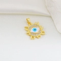 Close-up of gold evil eye sunburst pendant with blue zircon stones on white silk - Gold Radiating Sun Evil Eye Style (17)