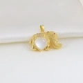 Detailed view of a golden elephant pendant with heart-shaped stone and red gemstone eye - Golden Heart White Stone Elephant Style (20)