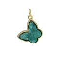 Detailed close-up of a golden butterfly pendant with green micro-set zirconia crystals - Butterfly Green Druzy (03)