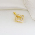 Macro shot of gold-plated geometric pendant with white enamel and baguette zircon stones - Gold L-Shaped Geometric Square Style (22)
