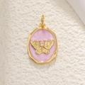 Detail view of an octagonal 18K gold-plated pendant with a pink butterfly and zircon inlay - Pink Octagonal Butterfly Style (14)