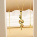 Detailed macro view of the gold snake pendant necklace set with colorful zirconia - Colorful Serpent (09)