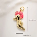 Detailed macro shot of golden seahorse jewelry charm with pink enamel and size measurements - Rose Red Seahorse