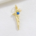 Close-up of golden flame evil eye pendant with blue bead detail and metallic sheen - Blue White Evil Eye Flame Style (08)