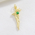 Macro shot of gold bird pendant with detailed feathers and a vibrant green gemstone - Green Gemstone Bird Style (09)