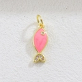 Macro detail of a gold fish pendant featuring pink enamel and sparkling crystals - Pink Fish