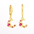 Detail of 18k gold plated moon earrings with red gemstones and small star charms - Red Crescent Moon