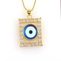 Macro shot of 18k gold plated evil eye pendant with micro-paved cubic zirconia stones - Blue Eye on White Base (05)