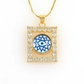Macro shot of 18k gold rectangular evil eye pendant with micro-paved cubic zirconia - Starry Blue Eye (08)