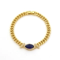 Lussuoso bracciale a catena cubana dorata con zircone blu a taglio marquise centrale - Blu scuro