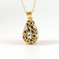 Collier pendentif œuf mauvais œil plaqué or 18K avec design en maille ajourée - Multicolore (04)