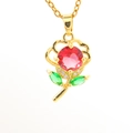 Floral pendant necklace with red gemstone and green leaves on a gold chain - Ruby Rose (06)