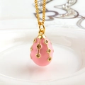 Pink enamel egg pendant necklace in 18k gold plated copper with sparkling crystals - Peach