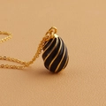 Luxurious egg-shaped 18k gold plated necklace with black enamel spiral pattern pendant - Black