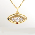Collar con colgante de ojo de perla y circonitas chapado en oro 18k sobre fondo gris - Estilo Ojo Perla Gema Azul Rojo (3)