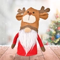 Rudolph Christmas gnome with brown reindeer antlers and white beard on wooden table - Corduroy Christmas Doll Reindeer