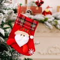 Plaid trim Christmas stocking featuring a 3D Santa Claus and white snowflake embroidery - Santa Claus Style