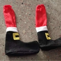Kerststoelpoothoezen ontworpen als de laarzen van de Kerstman met decoratieve gespen - Effen Kleur Kerst Laarzen Stijl