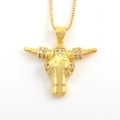 Macro view of gold bull head pendant featuring polished finish and sparkling crystal accents - Polished Bull Head (01)