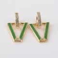 Macro detail of V-shaped gold earrings with green enamel and sparkling crystals - Green