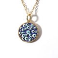 Detailed view of the gold-plated evil eye pendant necklace with blue enamel work - Deep Blue (01)