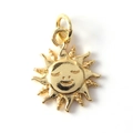 Macro shot of gold-plated sun smile pendant with relief texture and radiant rays - Sun Smile Face Shape (09)