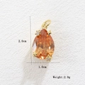 Detailed size and weight view of pear-shaped amber zircon pendant with gold accents - Orange Pear Style (05)