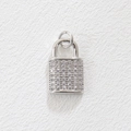 Detailed close-up of a silver-colored padlock charm fully paved with shiny zircons - Lock 1 (Silver)