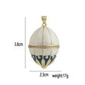 Detailansicht eines Faberge-Stil Ei-Anhängers in Dunkelblau und Gold mit Größenangaben - Retro-Ei-Stil (8)