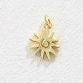 Macro shot of gold sun pendant with spiral center and polished mirror finish for DIY jewelry - Sun (Gold)