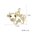 Dettaglio del ciondolo a forma di mucca dorata con zirconi, misura 1,6 cm x 2,0 cm - Forma di Mucca Traforata Oro