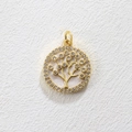 Macro shot of gold tree of life pendant with white zirconia inlay and pearl background - Gold Enamel Tree Of Life Style (7)
