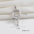 Silver snake pendant with crystal pavé and green gem eyes, 3.4cm tall weighing 2.7g - Silver Green Eye Snake (10)