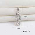 Detailed macro view of seahorse pendant with clear zircons and 2.5cm height dimension - Silver Mini Seahorse (11)