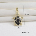 Detailed view of turtle pendant with gold plating, black enamel shell and white zircons - Gold Enamel Little Tortoise (01)