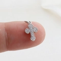 Macro shot of tiny silver cross pendant with sparkling zircons held on a fingertip - Silver Pave Rhinestone (10)