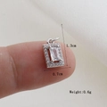 Macro detail of rectangle micro-pave pendant with 1.3cm height and 0.7cm width dimensions - Silver Rectangular Frame Style (06)
