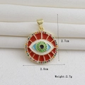 Detalle de colgante ojo de la suerte bañado en oro 18k con circonitas y esmalte rojo - Estilo Mal de Ojo Redondo de Esmalte Rojo (01)