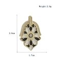 Detailed Hamsa charm with star pattern and zircon inlay measuring 2.6cm by 1.7cm - Black and White Star Hamsa (01)